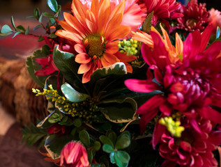 Harvest Basket Flower Arrangement, Multiple Flowers and Colors Reflecting Fall Season