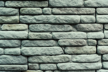 Old grunge orange brick background.