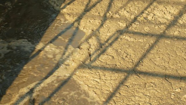 Biological purification of water sewage treatment plant waste water bubbles in the tank, clarifier activated sludge industrial wastewaters process using aeration and biology floc composed protozoa