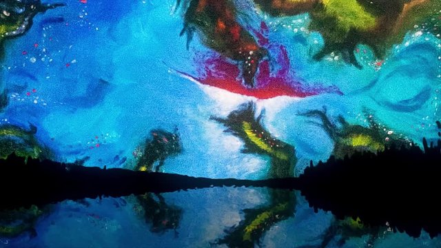 Abstract colourful sky with unusual shapes and forms reflected in the lake at night, Salvador Dali style. Abstract scenery of forest silhouett, colourful stains on the night sky reflected in the lake.