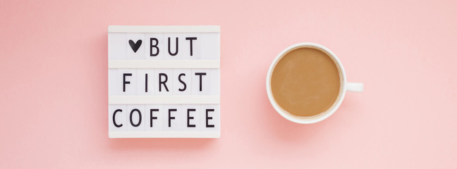 But first coffee text on lightbox with Coffee Cup