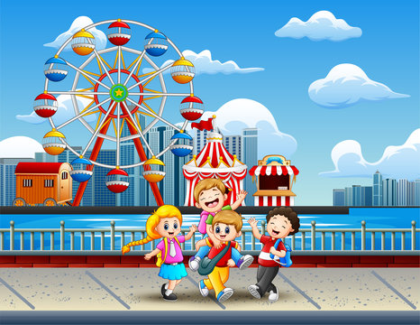Cartoon of Children having fun on the lakeside with amusement park background