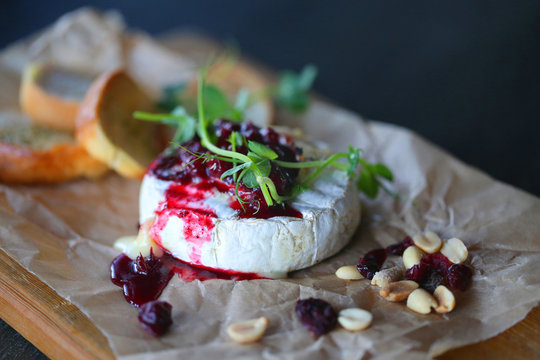 Bright macro photo of beautiful delicious fresh cheese with berries