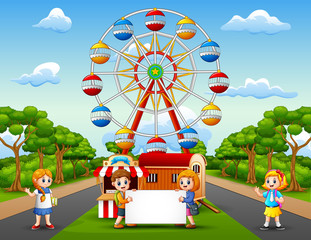 Obraz na płótnie Canvas Cartoon of two kids holding a white board with amusement park background