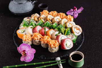 sushi on black background