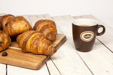 Buttercake with raisins and croissant