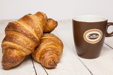 Buttercake with raisins and croissant