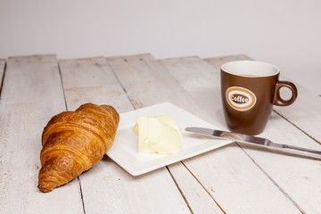 Buttercake with raisins and croissant