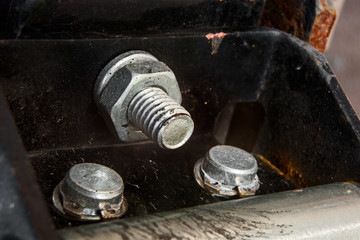 Nut with a washer on the bolt