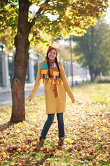 beautiful woman in autumn park