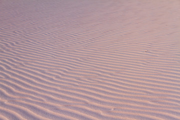 waves in white sand