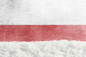 Naklejka premium Winter grunge background with snowdrift and Polish flag in the backdrop