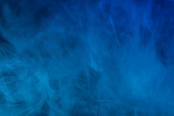 Colorful smoke close-up on a black background