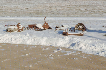 battlefield remnants of damaged and exploded armored vehicles
