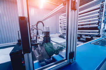 Modern automated production line in factory. Plastic bag manufacturing process