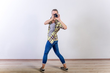 different photographer poses: bending, squatting, lying down