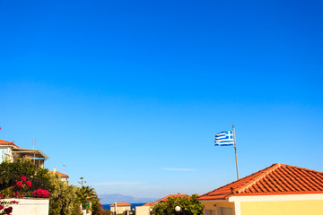 Blue and white Greek flag waving on wind