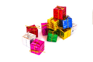 Pile of colorful gift boxes on white background