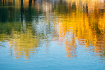 Autumn maple reflection in water at Gyeongbokgung Palace in Seoul, Korea
