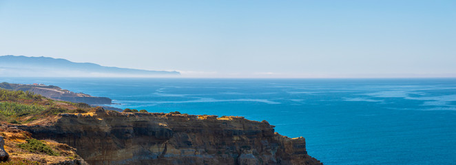 Scenic panoramic view. Seascape with cliffs and nature at the coast of sea or ocean © rostovdriver