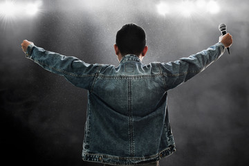 Singer holding microphone