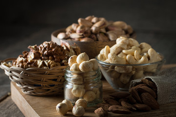 mix of nuts on a wooden table