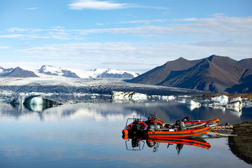 Boat Rides on Ice Lagoon, Iceland. Sunny frosty view of the fjord and ice icebergs