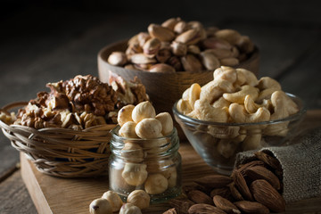 mix of nuts on a wooden table