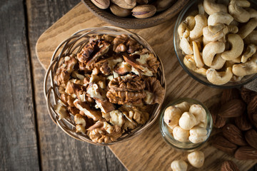 mix of nuts on a wooden table