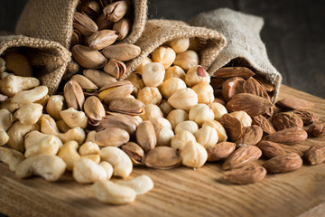 mix of nuts on a wooden table