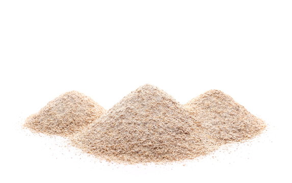 Pile of integral wheat flour isolated on white