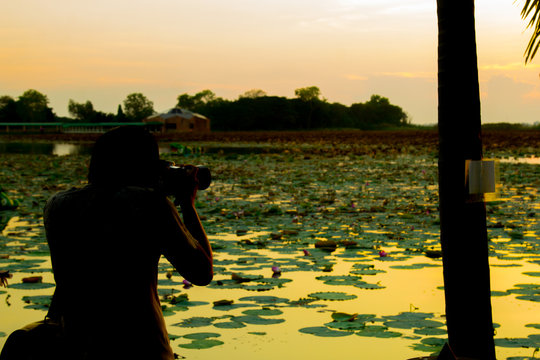 Twilight shot, Photographers are taking pictures of nature at Bueng See Fai, Phichit, Thailand