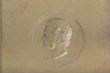 Vintage background from cover of old books with portrait of Alexandr Pushkin