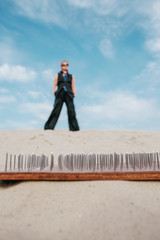 crazy funny grunge punk redhead woman with dreadlocks in office clothes and sunglasses in the...