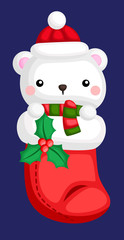 a cute polar bear inside a Santa sock
