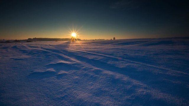 4k timelapse of beautiful winter field at sunrise. 4096x2304,25fps