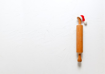 Christmas Baking background. Rolling pin on a white background