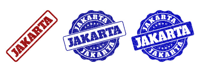 JAKARTA scratched stamp seals in red and blue colors. Vector JAKARTA overlays with grunge style. Graphic elements are rounded rectangles, rosettes, circles and text captions.