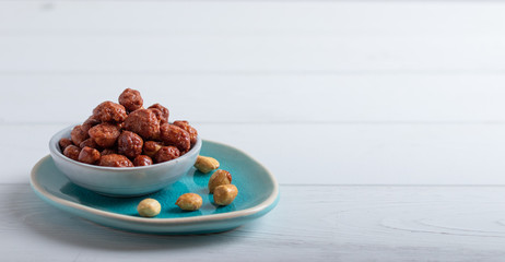 caramelized nuts in bowl