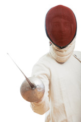 Fencing. fencer in costume and mask holding the sword. Ready to attack