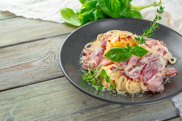Pasta Carbonara. Spaghetti with bacon, parsel and parmesan cheese