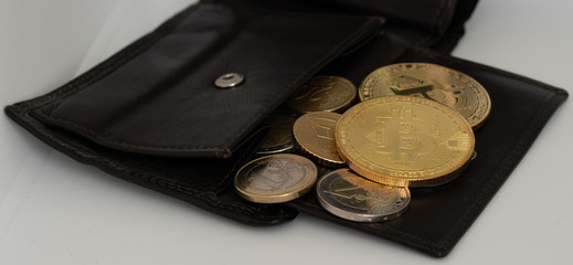 bitcoin in a wallet with euro coins