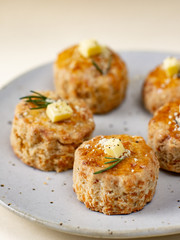Homemade Cheese Scones with butter.