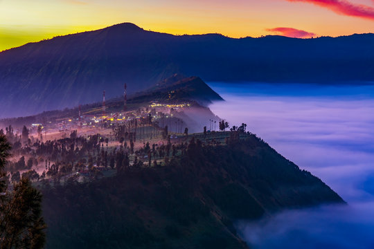 Low clouds over Cemoro Lawang at sunrise, Bromo Tengger Semeru National Park, East Java, Indonesia