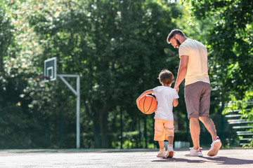 Young family on the basketball court - 236942554