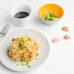 Noodles with bell pepper on plate