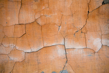 Grungy and cracked wall texture, brown cracked plaster