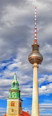 Belltower of St. Mary's Church (Marienkirche) and TV Tower (Fernsehturm) in Berlin