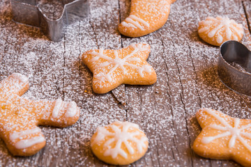 Obraz na płótnie Canvas Homemade Christmas cookies on wooden background