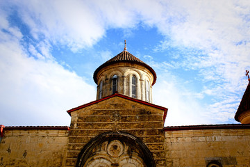 Fototapeta na wymiar Motsameta, Kutaisi It is a small and very beautiful monastery with round turrets crowned with peaked tent-shaped domes.